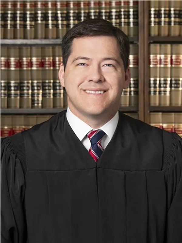 Judge Adam L. Caine