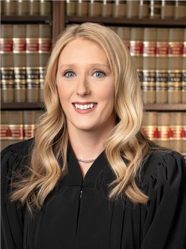 Commissioner Lisa M. Dube